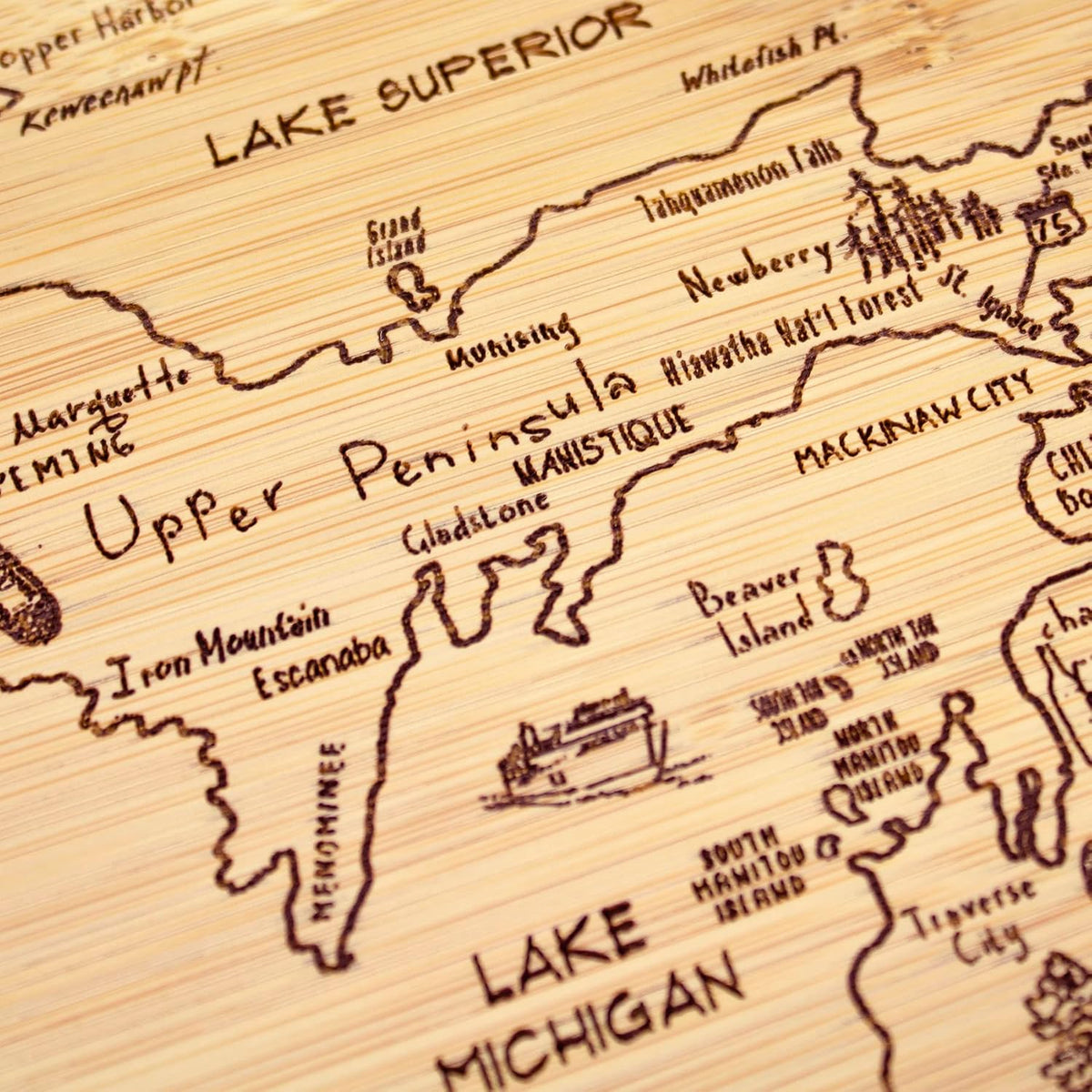 A Slice of Life New Jersey Engraved Map Cutting Board | 11” x 8.75” charcuterie board with engraved state map artwork. Smooth reverse side for food prep. Hang tie for wall display. - Colors B
