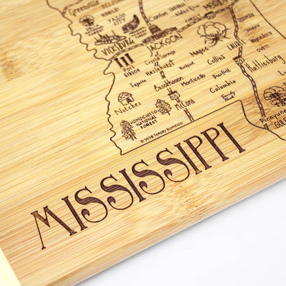 A Slice of Life New Jersey Engraved Map Cutting Board | 11” x 8.75” charcuterie board with engraved state map artwork. Smooth reverse side for food prep. Hang tie for wall display. - Colors B