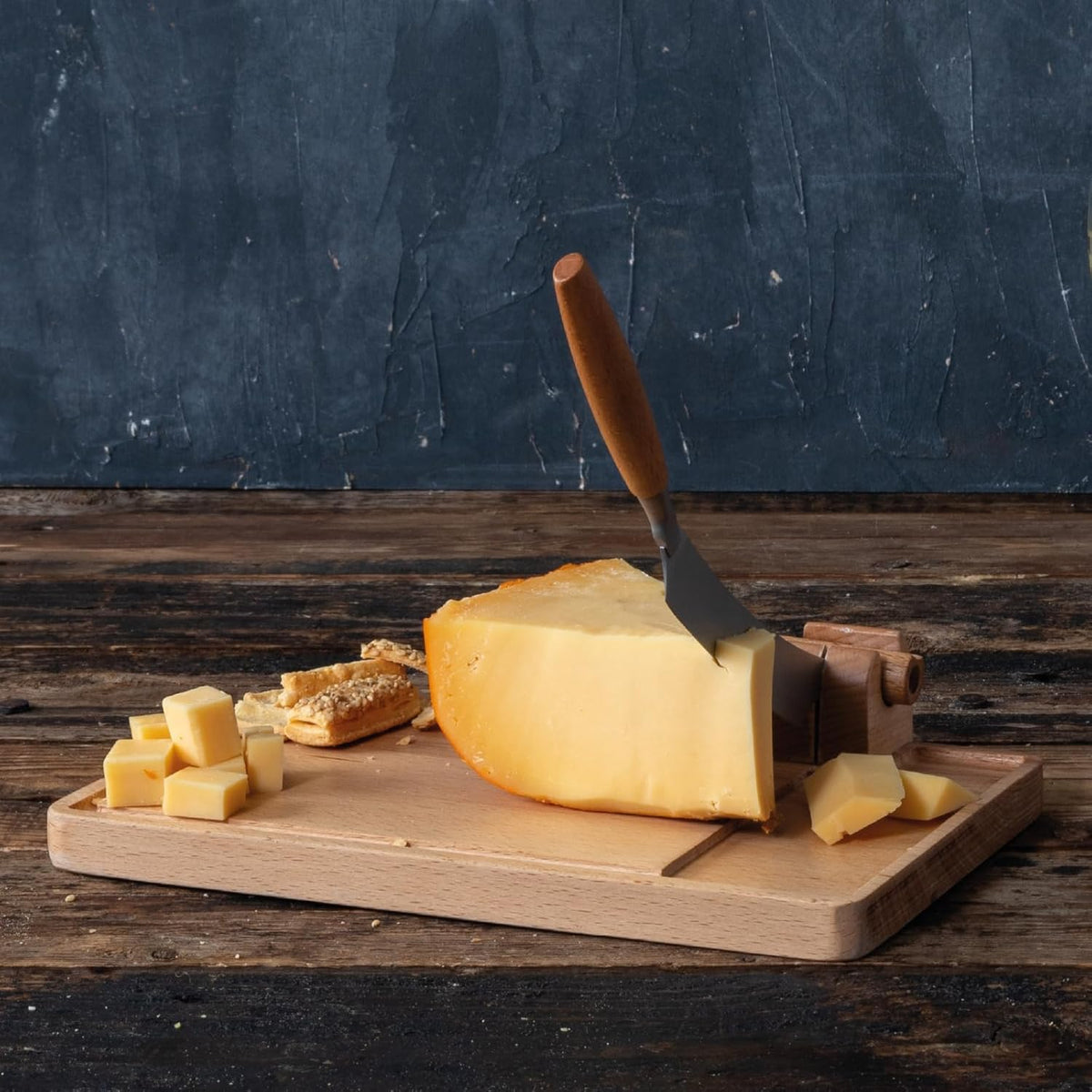 Cheese Cutter Lumberjack Amigo - Serving Board with Cheese Knife - Beechwood and Stainless Steel - for Cheese and Sausage - Safe Cutting - with Crumb Catcher - 9 Inches