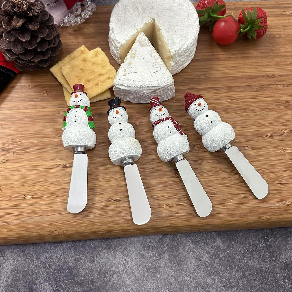Snowmen Cheese Spreaders, Hand-Painted Resin Handles with Stainless Steel Blades for Spreading Cream Cheese, Butter, and Jam, Assorted Designs, Set of 4