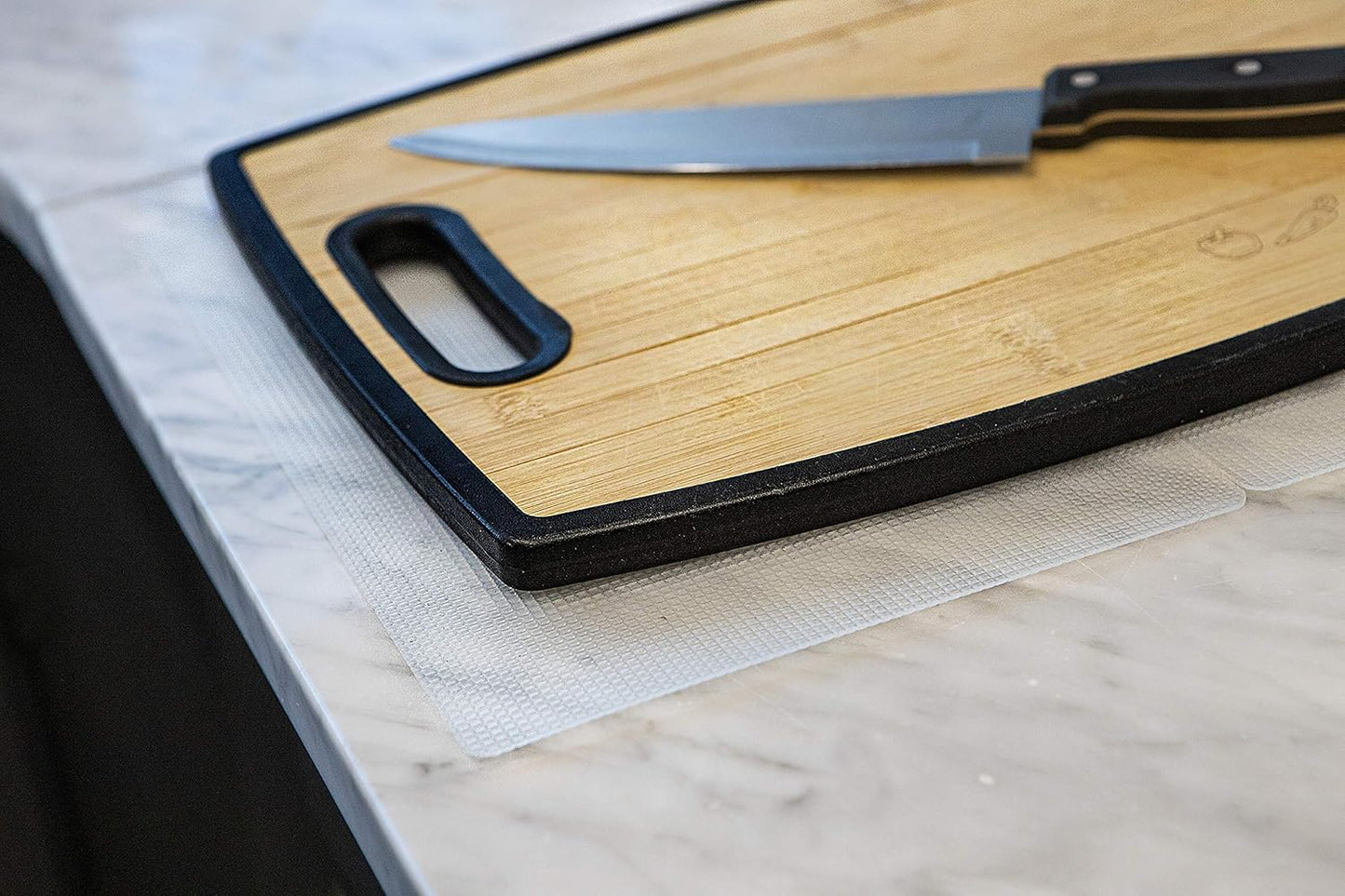 8"x12" Non-Slip Mat for Cutting Board, Black, 1-Pack | Gription's unique non-rubber material with double-sided traction is perfect for securing cutting boards, kitchen items, jars