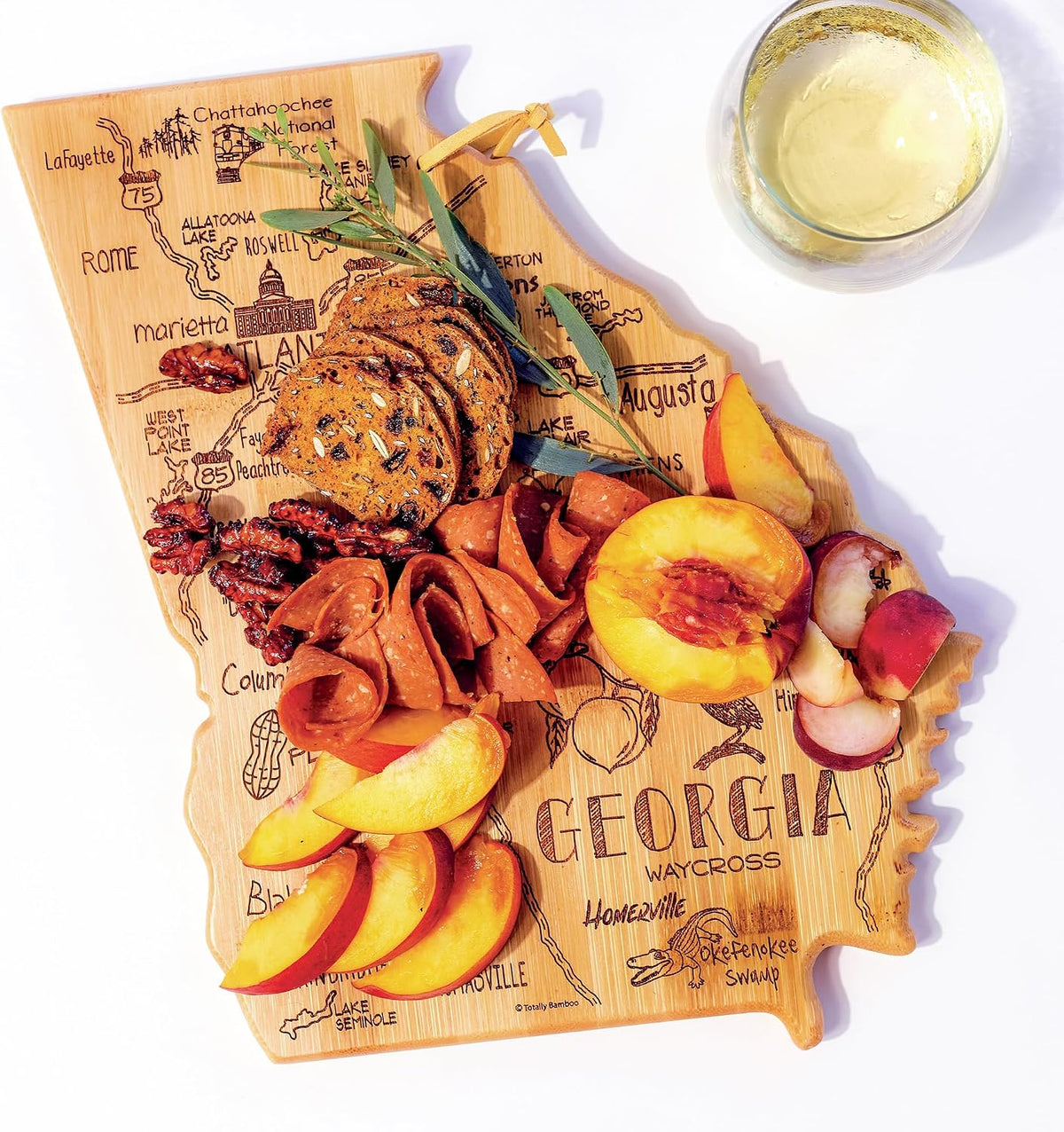 Destination Georgia State Shaped Cutting Board | State charcuterie serving board with engraved map artwork. Smooth reverse side for food prep. Hang tie for wall display.