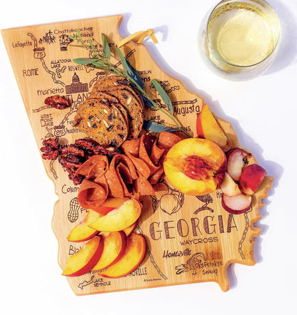 Destination Georgia State Shaped Cutting Board | State charcuterie serving board with engraved map artwork. Smooth reverse side for food prep. Hang tie for wall display.