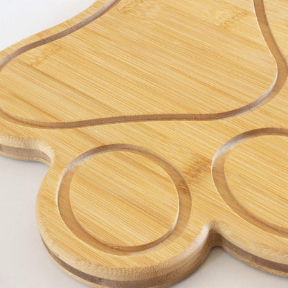 Dog Paw Shaped Cutting and Charcuterie Board, 11 x 10 in | Bamboo paw-shaped serving board with juice grooves for prep and entertaining. Built-in keyhole for easy wall display.