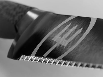 Wüsthof Performer 7" Hollow Edge Santoku Knife, Black