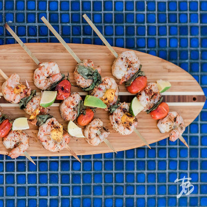 Lil Surfer Small Surfboard Cutting Board, 14.5 x 6 in | Small surfboard-shaped serving board brings beach vibes to charcuterie and snacks. Hang tie for easy wall display.