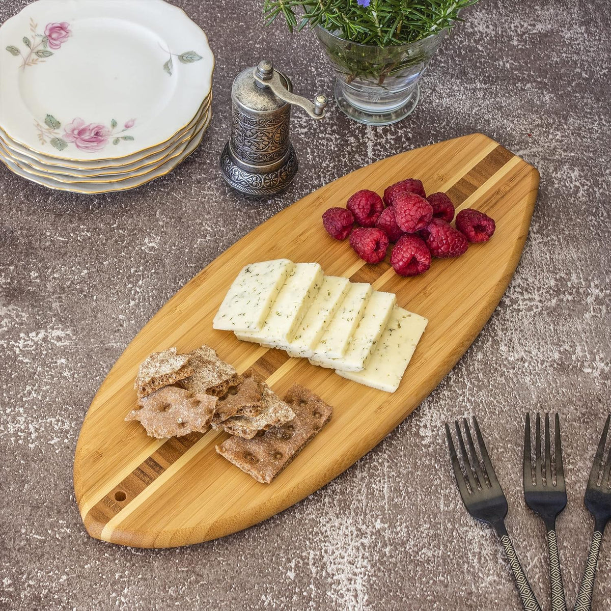 Lil Surfer Small Surfboard Cutting Board, 14.5 x 6 in | Small surfboard-shaped serving board brings beach vibes to charcuterie and snacks. Hang tie for easy wall display.
