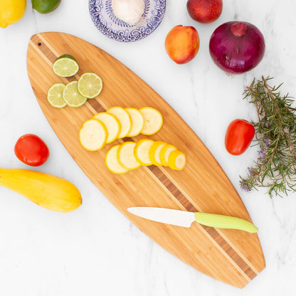 Lil Surfer Small Surfboard Cutting Board, 14.5 x 6 in | Small surfboard-shaped serving board brings beach vibes to charcuterie and snacks. Hang tie for easy wall display.