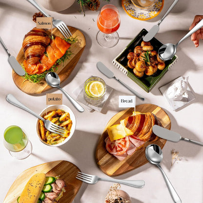 Charcuterie Boards Accessories Set 68-Piece includes wooden-handled cheese knife set, silver cheese spreader butter knife set, mini tongs spoons forks honey dipper napkins and cocktail picks.