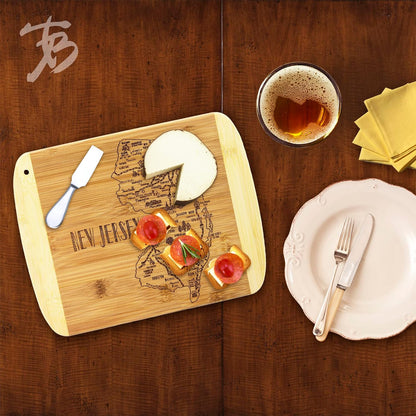 A Slice of Life New Jersey Engraved Map Cutting Board | 11” x 8.75” charcuterie board with engraved state map artwork. Smooth reverse side for food prep. Hang tie for wall display. - Colors A