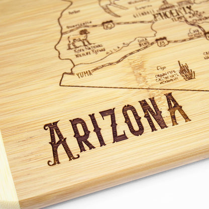 A Slice of Life New Jersey Engraved Map Cutting Board | 11” x 8.75” charcuterie board with engraved state map artwork. Smooth reverse side for food prep. Hang tie for wall display. - Colors A