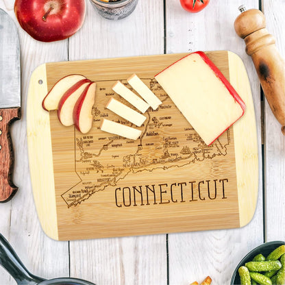 A Slice of Life New Jersey Engraved Map Cutting Board | 11” x 8.75” charcuterie board with engraved state map artwork. Smooth reverse side for food prep. Hang tie for wall display. - Colors A