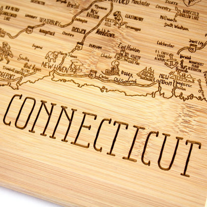 A Slice of Life New Jersey Engraved Map Cutting Board | 11” x 8.75” charcuterie board with engraved state map artwork. Smooth reverse side for food prep. Hang tie for wall display. - Colors A
