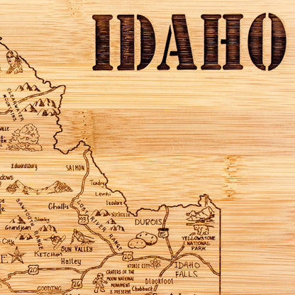 A Slice of Life New Jersey Engraved Map Cutting Board | 11” x 8.75” charcuterie board with engraved state map artwork. Smooth reverse side for food prep. Hang tie for wall display. - Colors A