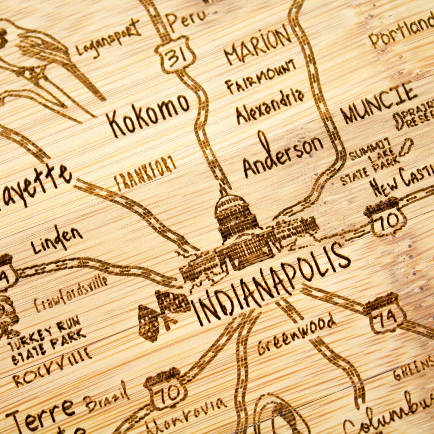 A Slice of Life New Jersey Engraved Map Cutting Board | 11” x 8.75” charcuterie board with engraved state map artwork. Smooth reverse side for food prep. Hang tie for wall display. - Colors A