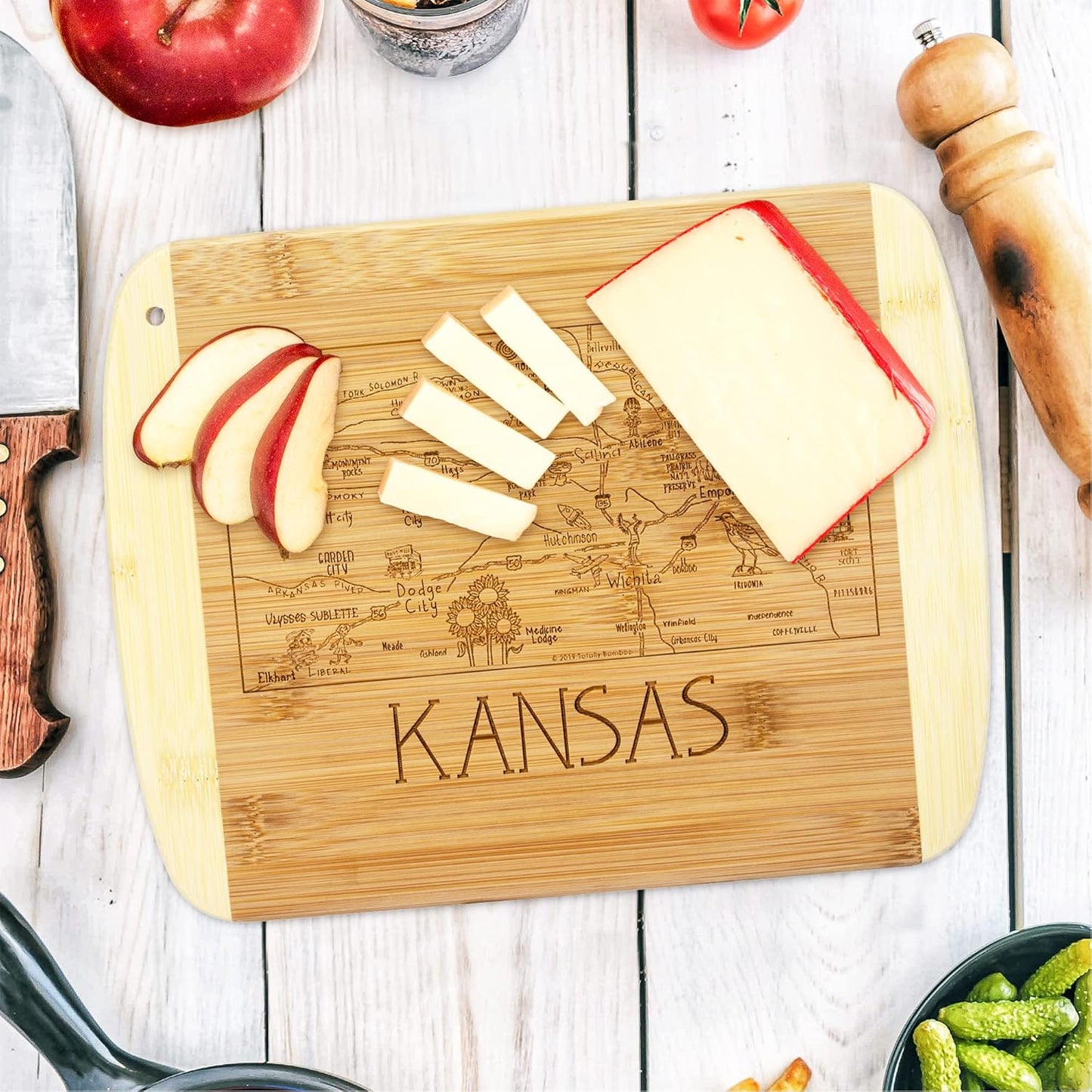 A Slice of Life New Jersey Engraved Map Cutting Board | 11” x 8.75” charcuterie board with engraved state map artwork. Smooth reverse side for food prep. Hang tie for wall display. - Colors A