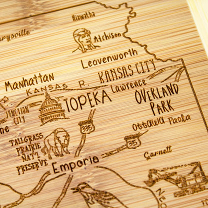 A Slice of Life New Jersey Engraved Map Cutting Board | 11” x 8.75” charcuterie board with engraved state map artwork. Smooth reverse side for food prep. Hang tie for wall display. - Colors A