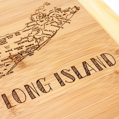 A Slice of Life New Jersey Engraved Map Cutting Board | 11” x 8.75” charcuterie board with engraved state map artwork. Smooth reverse side for food prep. Hang tie for wall display. - Colors A