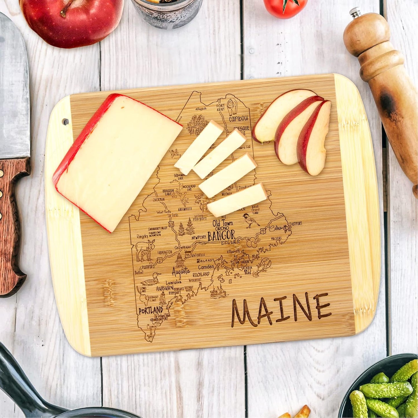 A Slice of Life New Jersey Engraved Map Cutting Board | 11” x 8.75” charcuterie board with engraved state map artwork. Smooth reverse side for food prep. Hang tie for wall display. - Colors A