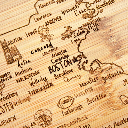 A Slice of Life New Jersey Engraved Map Cutting Board | 11” x 8.75” charcuterie board with engraved state map artwork. Smooth reverse side for food prep. Hang tie for wall display. - Colors A