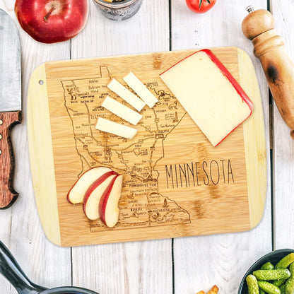 A Slice of Life New Jersey Engraved Map Cutting Board | 11” x 8.75” charcuterie board with engraved state map artwork. Smooth reverse side for food prep. Hang tie for wall display. - Colors A