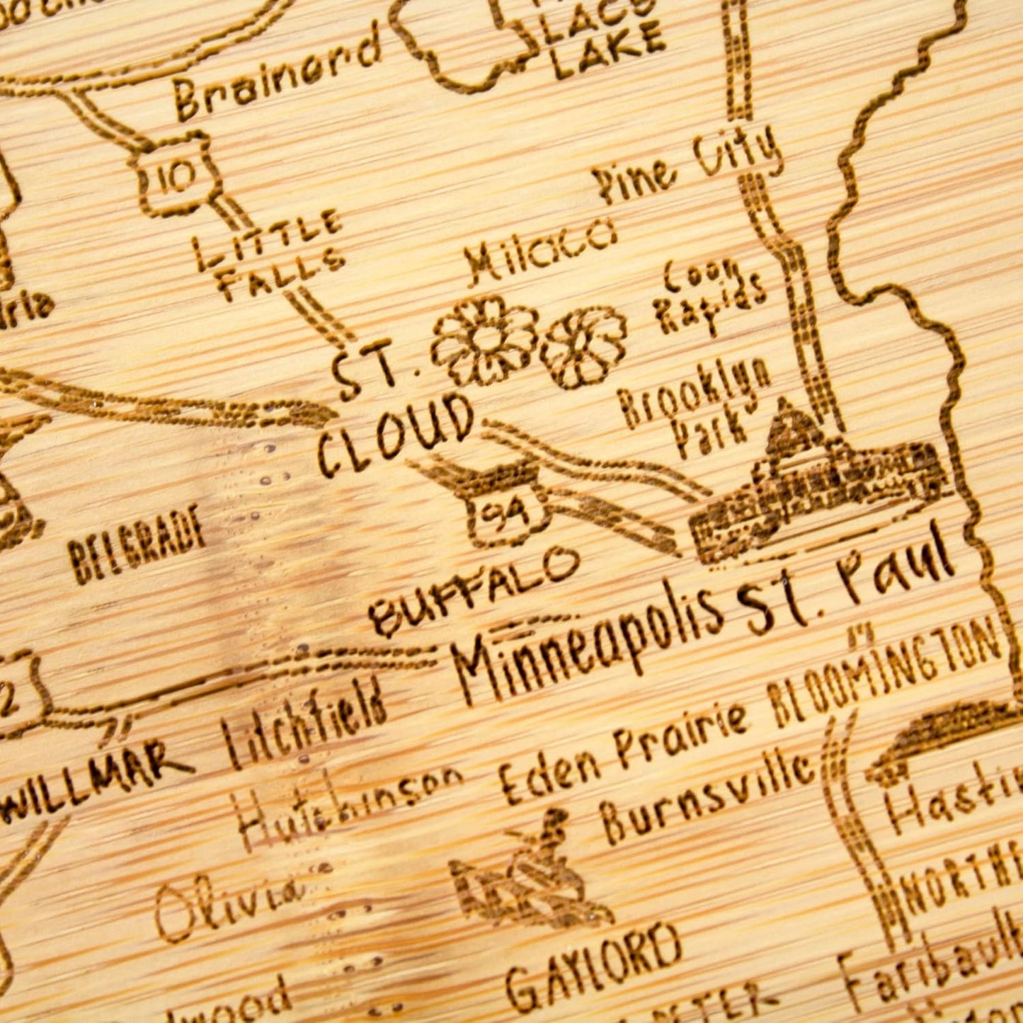A Slice of Life New Jersey Engraved Map Cutting Board | 11” x 8.75” charcuterie board with engraved state map artwork. Smooth reverse side for food prep. Hang tie for wall display. - Colors A