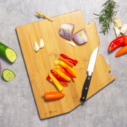 North Carolina State Shaped Cutting Board, Summer Stokes Art | State charcuterie board with colorful hand-drawn landscape art. Smooth reverse side for food prep. Hang tie for wall display. - Colors B