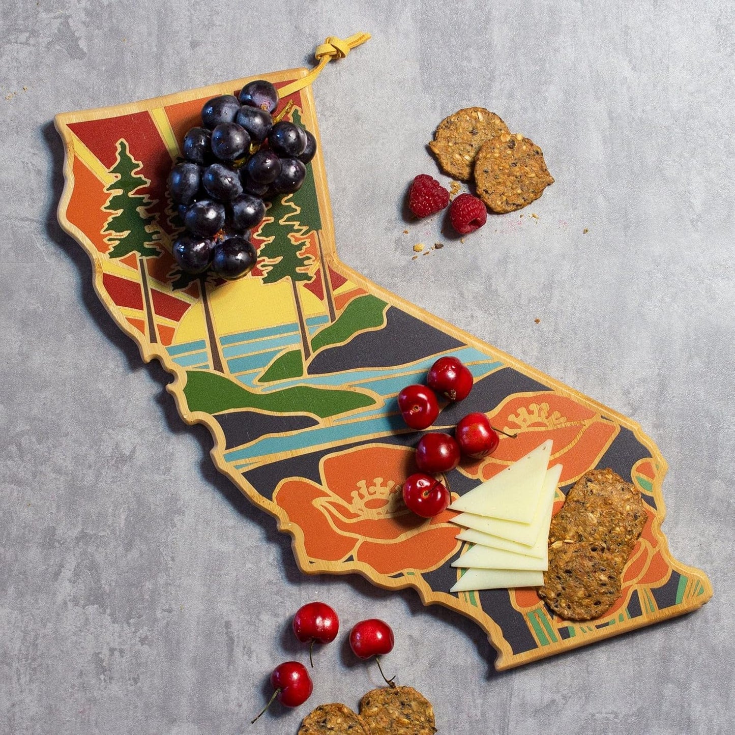 North Carolina State Shaped Cutting Board, Summer Stokes Art | State charcuterie board with colorful hand-drawn landscape art. Smooth reverse side for food prep. Hang tie for wall display. - Colors B