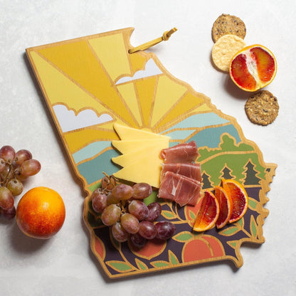 North Carolina State Shaped Cutting Board, Summer Stokes Art | State charcuterie board with colorful hand-drawn landscape art. Smooth reverse side for food prep. Hang tie for wall display. - Colors B