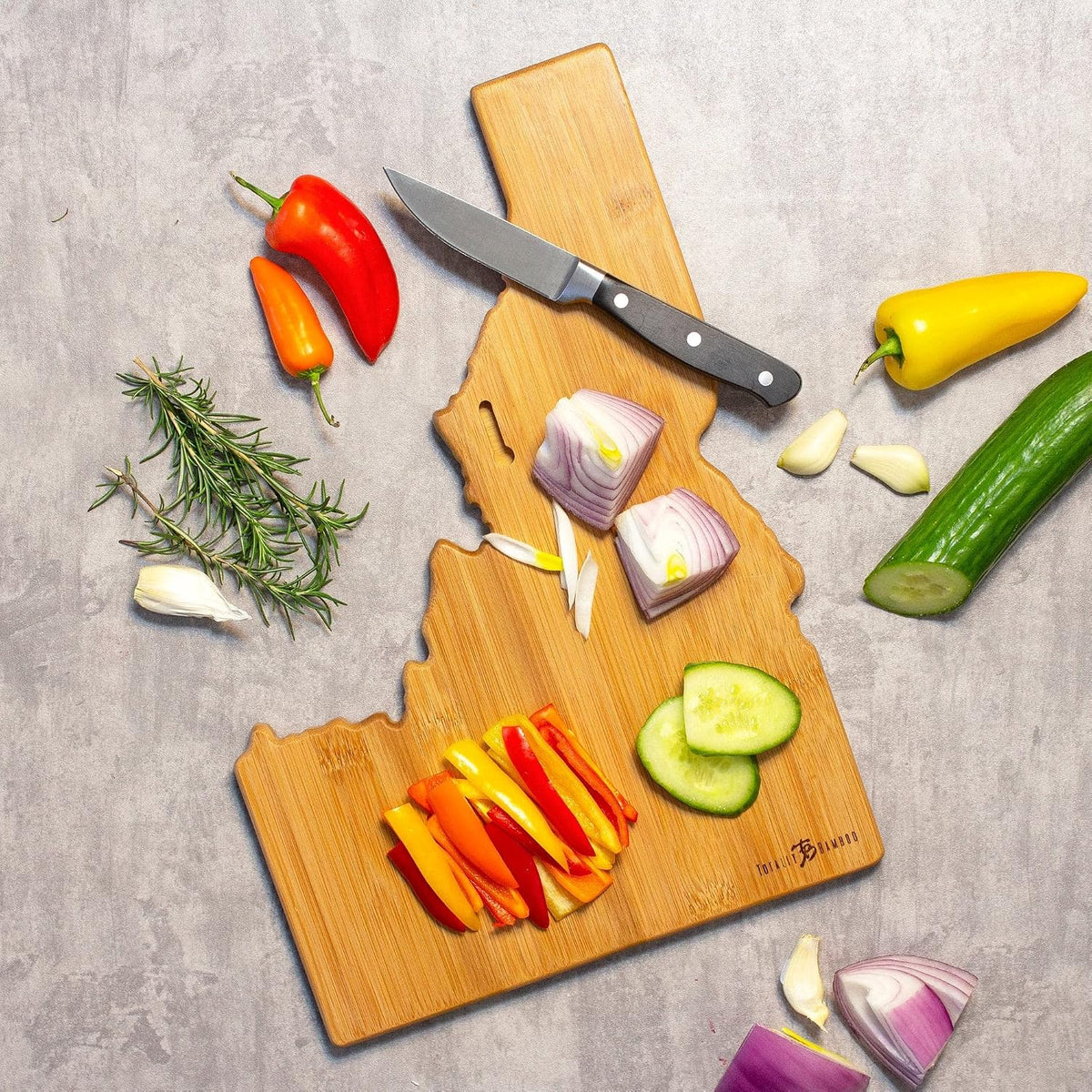 North Carolina State Shaped Cutting Board, Summer Stokes Art | State charcuterie board with colorful hand-drawn landscape art. Smooth reverse side for food prep. Hang tie for wall display. - Colors B