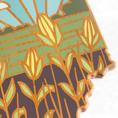 North Carolina State Shaped Cutting Board, Summer Stokes Art | State charcuterie board with colorful hand-drawn landscape art. Smooth reverse side for food prep. Hang tie for wall display. - Colors B