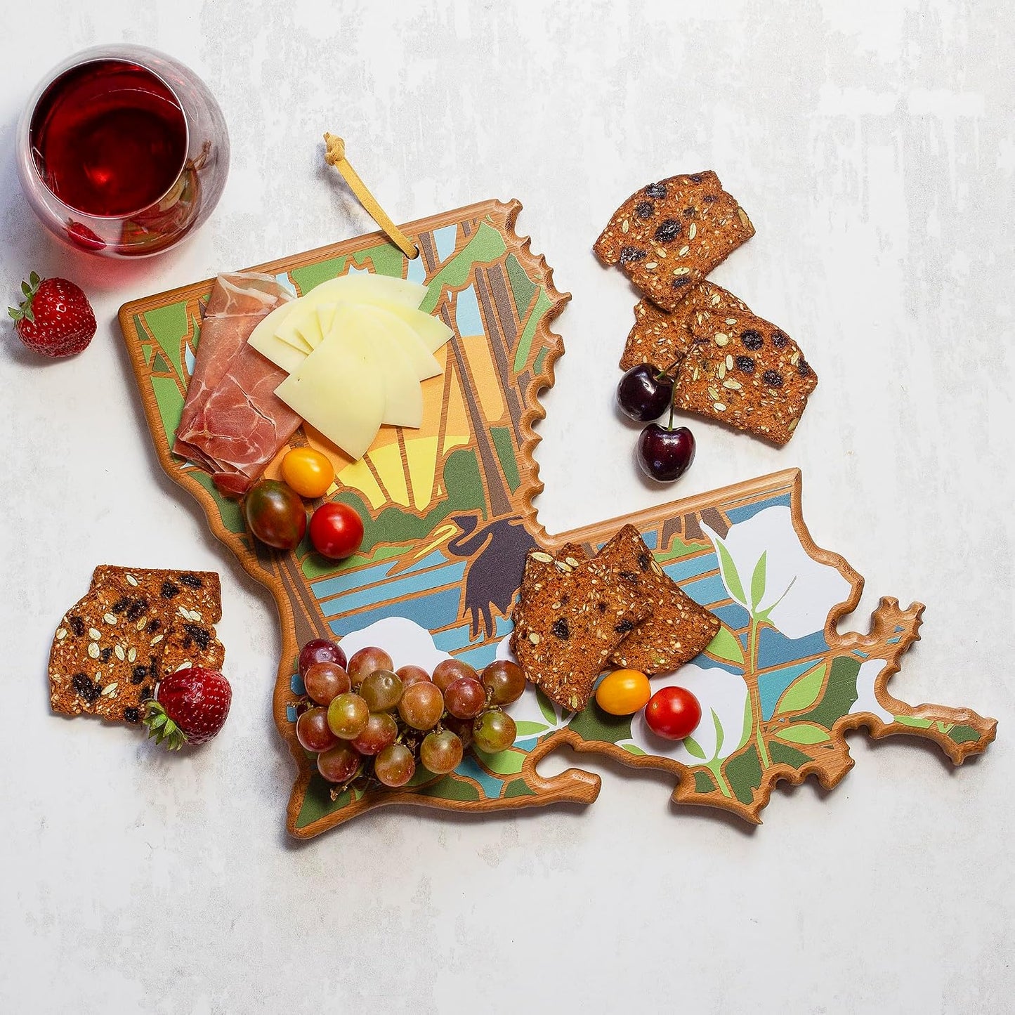 North Carolina State Shaped Cutting Board, Summer Stokes Art | State charcuterie board with colorful hand-drawn landscape art. Smooth reverse side for food prep. Hang tie for wall display. - Colors B