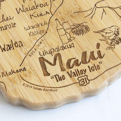 Destination Maui Serving and Cutting Board, Includes Hang Tie for Wall Display | Maui charcuterie serving board with engraved map artwork. Smooth reverse side for food prep. Hang tie for wall display.