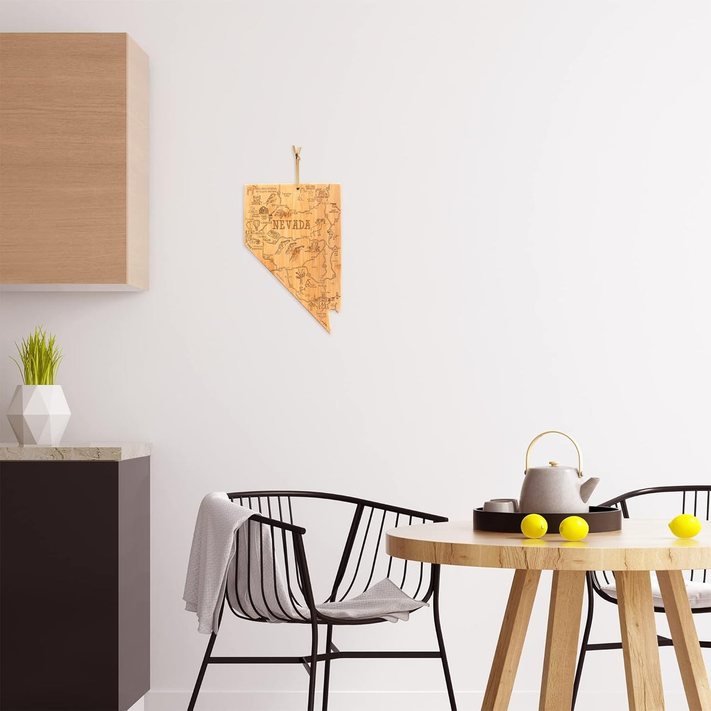 Destination Nevada State Shaped Cutting Board | State charcuterie serving board with engraved map artwork. Smooth reverse side for food prep. Hang tie for wall display.