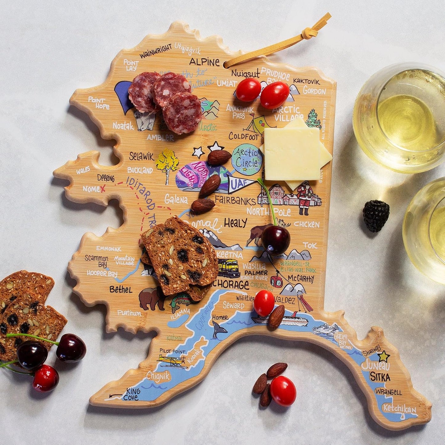 Tennessee State Shaped Cutting Board, Art by Fish Kiss | State charcuterie board with colorful hand-drawn map artwork. Smooth reverse side for food prep. Hang tie for wall display. - Colors B