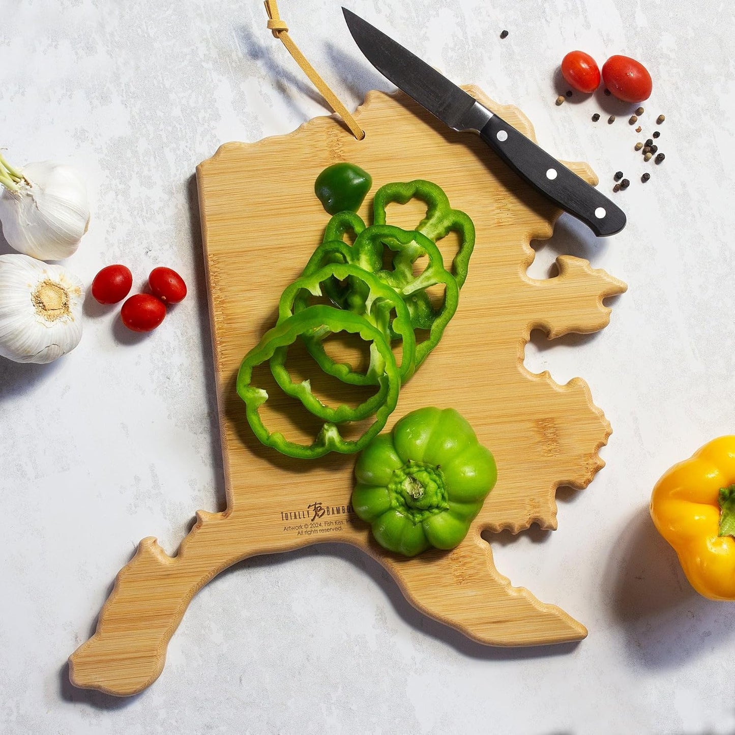 Tennessee State Shaped Cutting Board, Art by Fish Kiss | State charcuterie board with colorful hand-drawn map artwork. Smooth reverse side for food prep. Hang tie for wall display. - Colors B