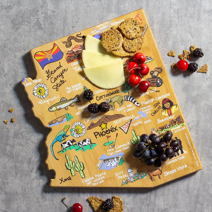 Tennessee State Shaped Cutting Board, Art by Fish Kiss | State charcuterie board with colorful hand-drawn map artwork. Smooth reverse side for food prep. Hang tie for wall display. - Colors B