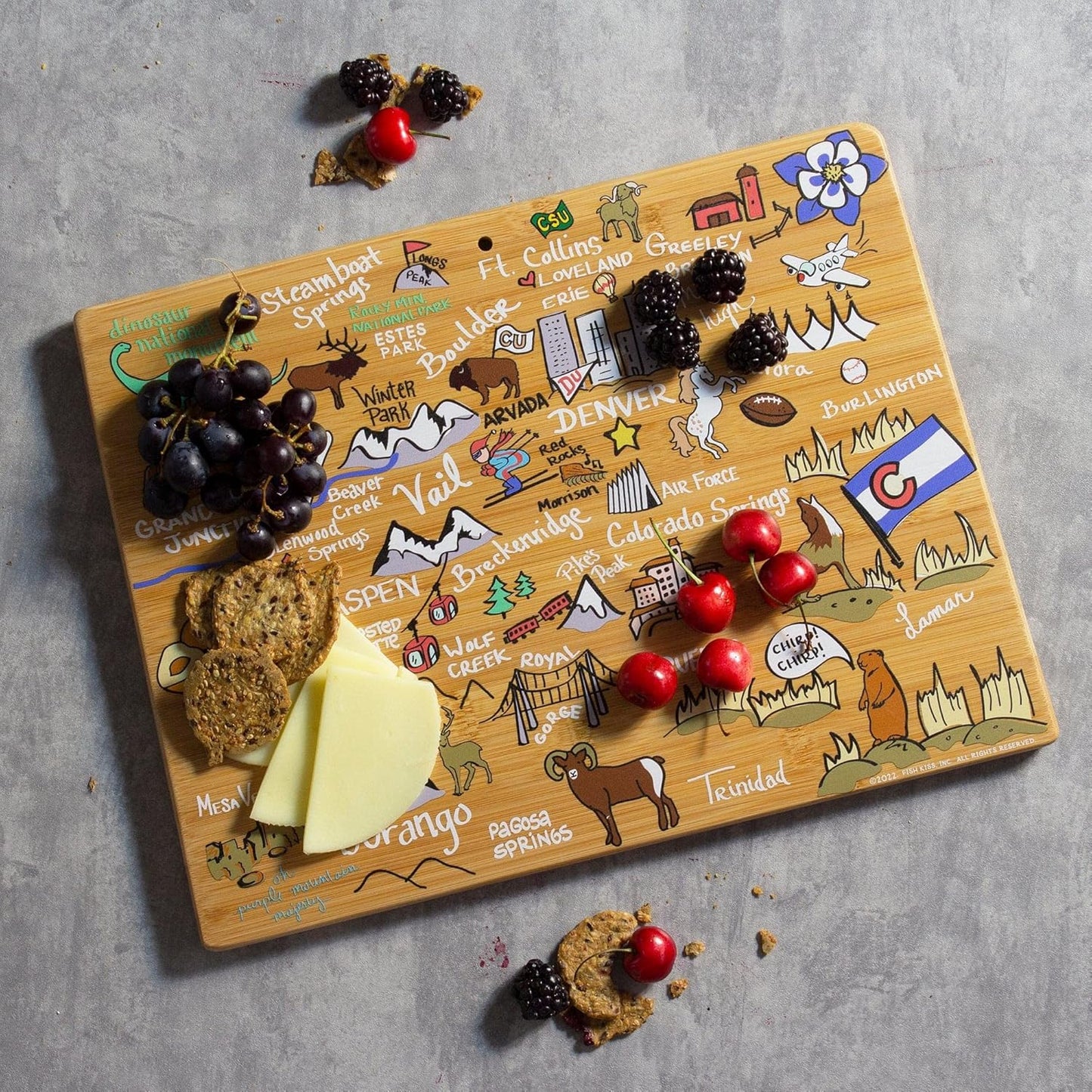 Tennessee State Shaped Cutting Board, Art by Fish Kiss | State charcuterie board with colorful hand-drawn map artwork. Smooth reverse side for food prep. Hang tie for wall display. - Colors B