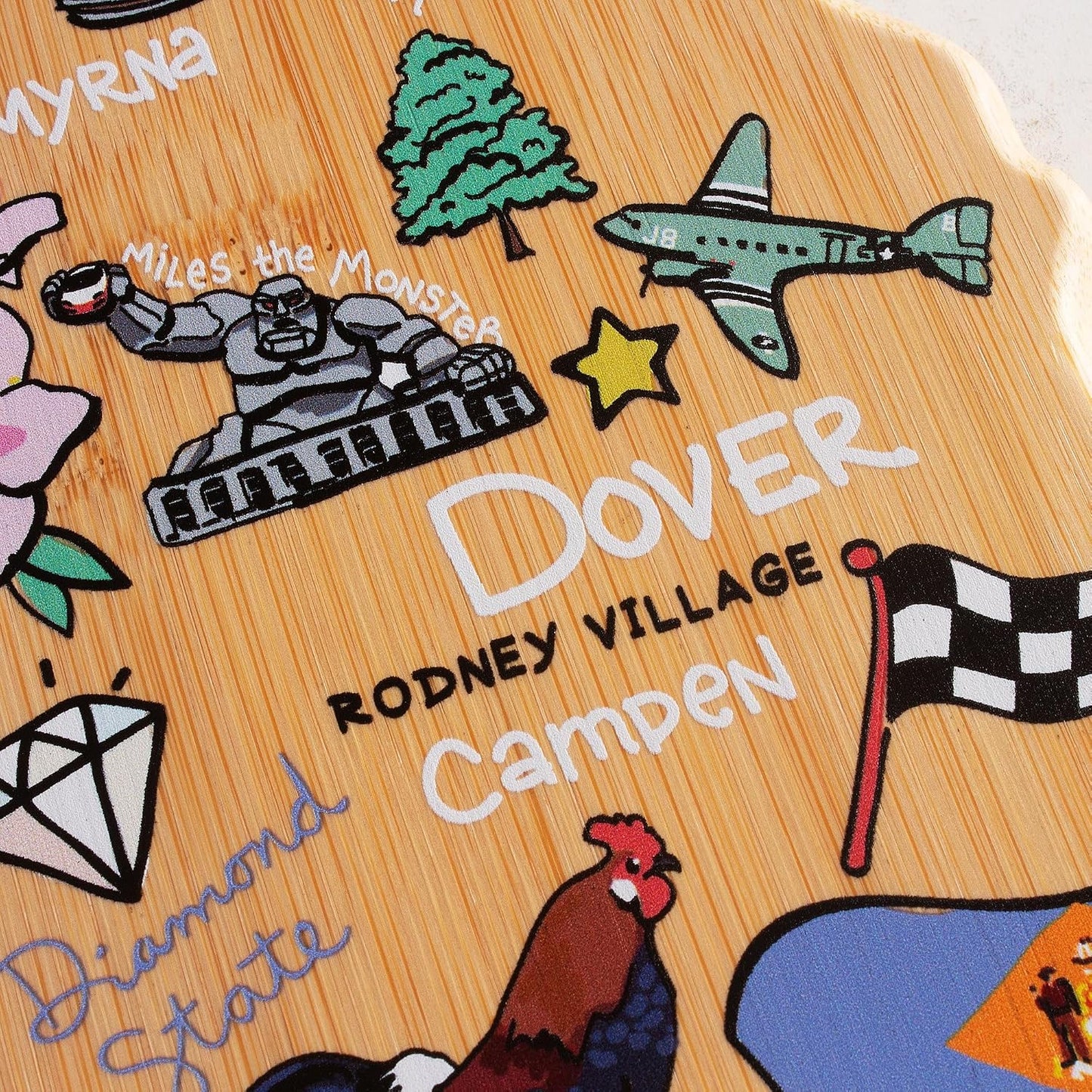 Tennessee State Shaped Cutting Board, Art by Fish Kiss | State charcuterie board with colorful hand-drawn map artwork. Smooth reverse side for food prep. Hang tie for wall display. - Colors B