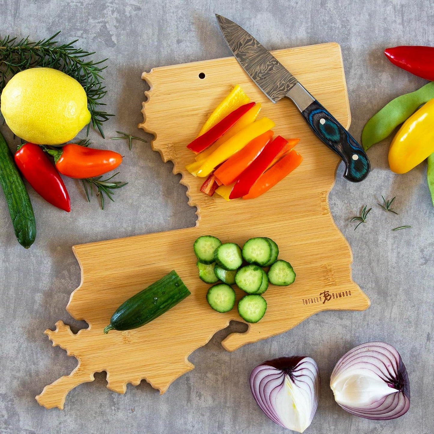 Tennessee State Shaped Cutting Board, Art by Fish Kiss | State charcuterie board with colorful hand-drawn map artwork. Smooth reverse side for food prep. Hang tie for wall display. - Colors B