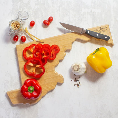 Tennessee State Shaped Cutting Board, Art by Fish Kiss | State charcuterie board with colorful hand-drawn map artwork. Smooth reverse side for food prep. Hang tie for wall display. - Colors B