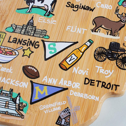 Tennessee State Shaped Cutting Board, Art by Fish Kiss | State charcuterie board with colorful hand-drawn map artwork. Smooth reverse side for food prep. Hang tie for wall display. - Colors B