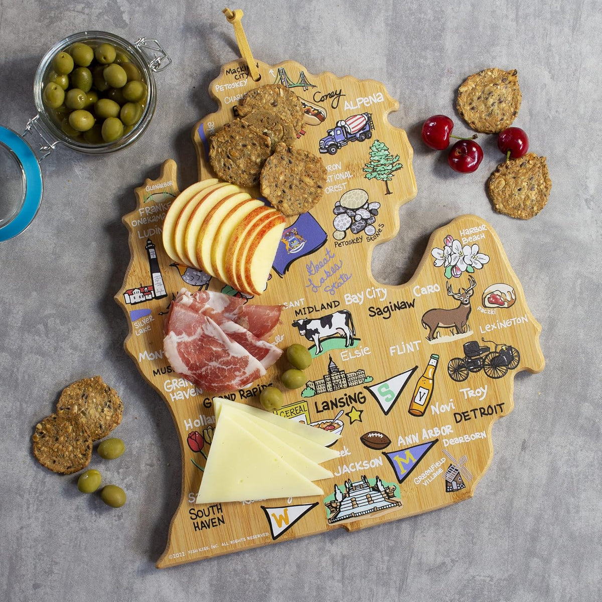 Tennessee State Shaped Cutting Board, Art by Fish Kiss | State charcuterie board with colorful hand-drawn map artwork. Smooth reverse side for food prep. Hang tie for wall display. - Colors B