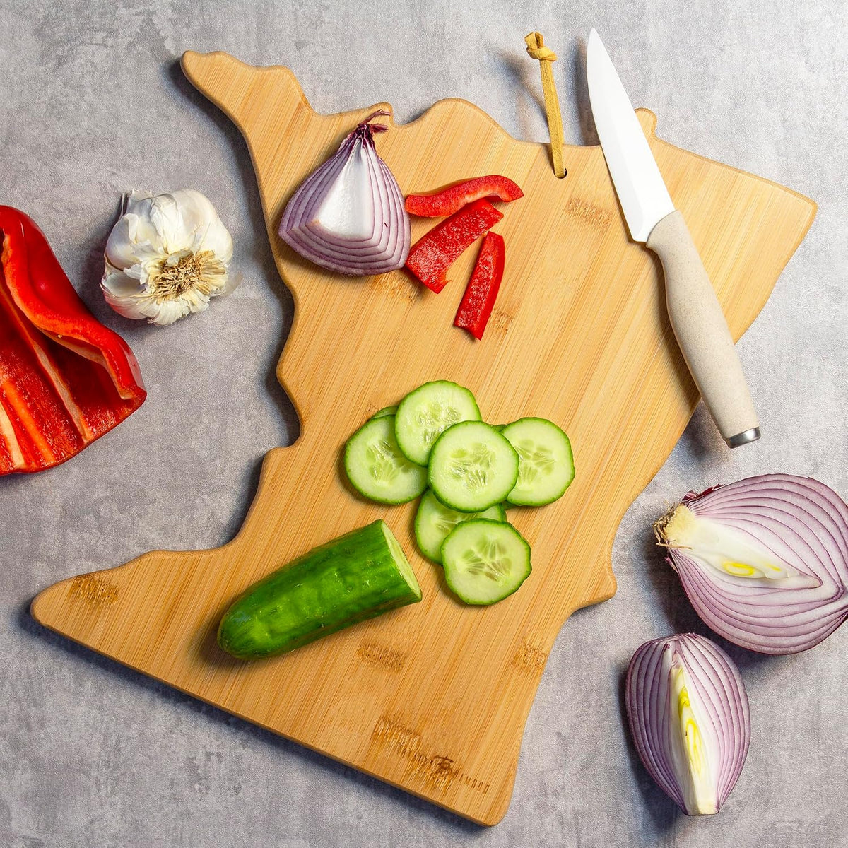 Tennessee State Shaped Cutting Board, Art by Fish Kiss | State charcuterie board with colorful hand-drawn map artwork. Smooth reverse side for food prep. Hang tie for wall display. - Colors B