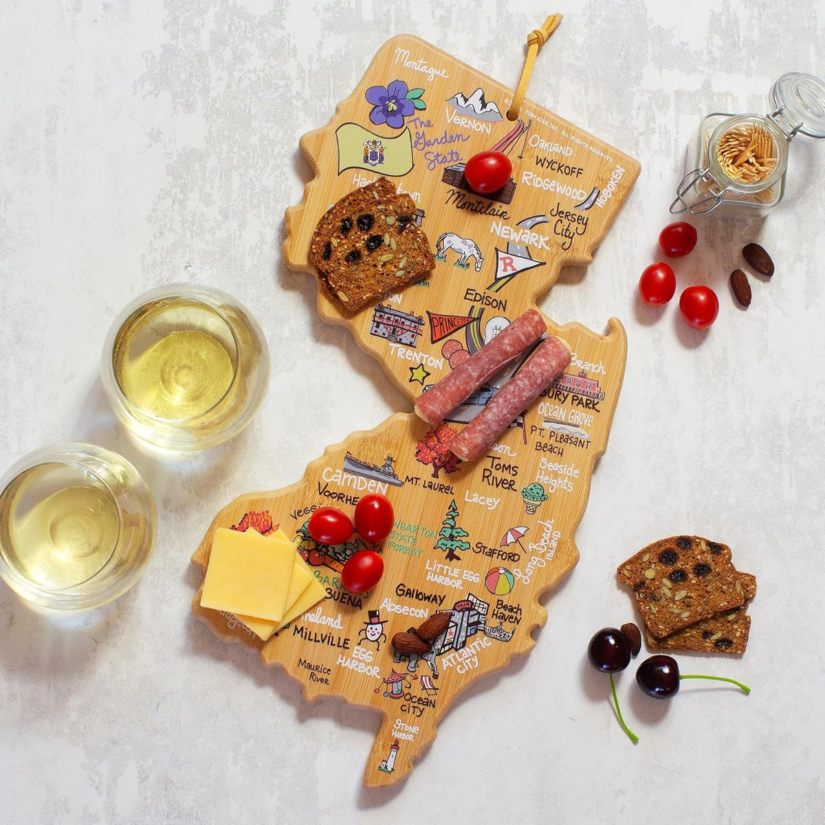 Tennessee State Shaped Cutting Board, Art by Fish Kiss | State charcuterie board with colorful hand-drawn map artwork. Smooth reverse side for food prep. Hang tie for wall display. - Colors B