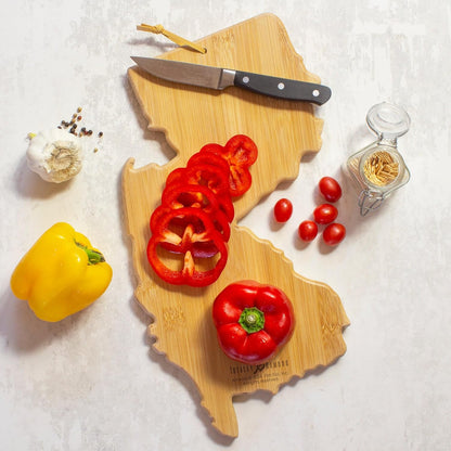 Tennessee State Shaped Cutting Board, Art by Fish Kiss | State charcuterie board with colorful hand-drawn map artwork. Smooth reverse side for food prep. Hang tie for wall display. - Colors B