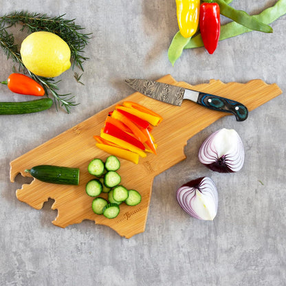 Tennessee State Shaped Cutting Board, Art by Fish Kiss | State charcuterie board with colorful hand-drawn map artwork. Smooth reverse side for food prep. Hang tie for wall display. - Colors B