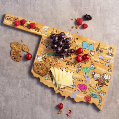 Tennessee State Shaped Cutting Board, Art by Fish Kiss | State charcuterie board with colorful hand-drawn map artwork. Smooth reverse side for food prep. Hang tie for wall display. - Colors B