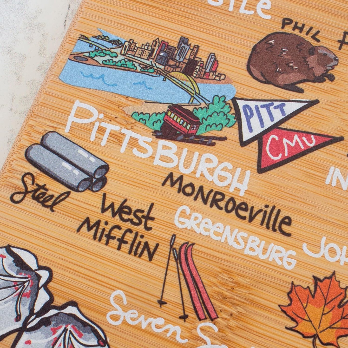 Tennessee State Shaped Cutting Board, Art by Fish Kiss | State charcuterie board with colorful hand-drawn map artwork. Smooth reverse side for food prep. Hang tie for wall display. - Colors B