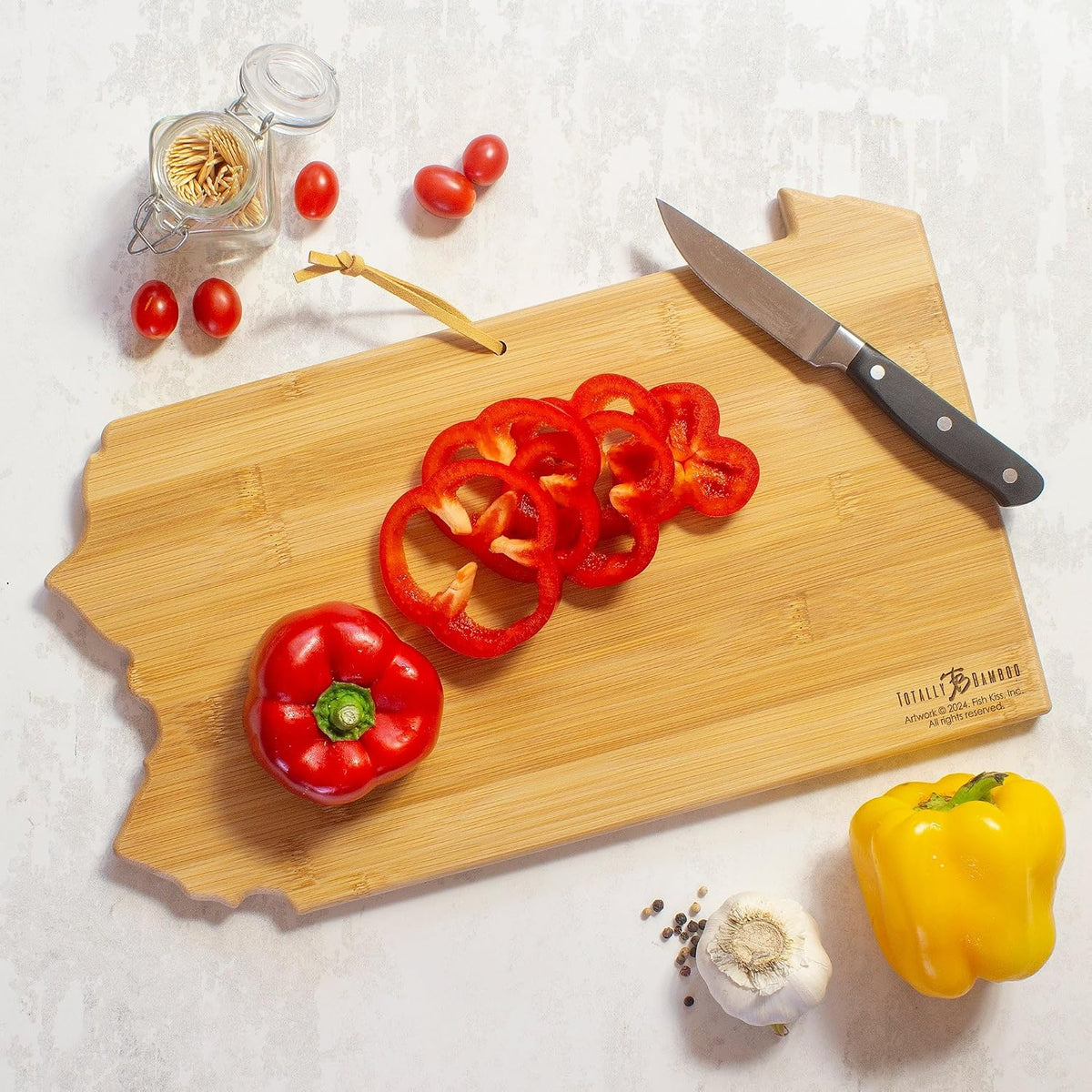 Tennessee State Shaped Cutting Board, Art by Fish Kiss | State charcuterie board with colorful hand-drawn map artwork. Smooth reverse side for food prep. Hang tie for wall display. - Colors B